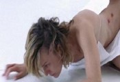Milla Jovovich as Alice nude at the end of Resident Evil.